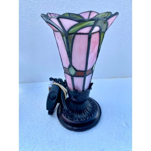 Tiffany-style stained glass table lamp featuring a pink and green design