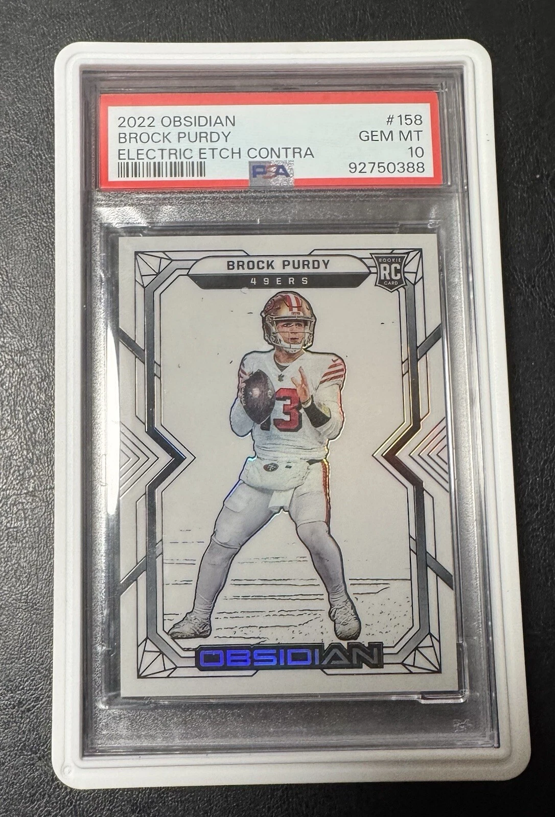 Brock Purdy Panini Obsidian #158 Electric Etch Contra