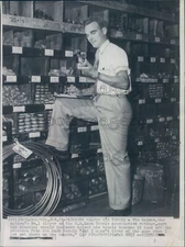 1952 Press Photo Tennis Star Vic Seixas Works in His Plumbing Supply Store