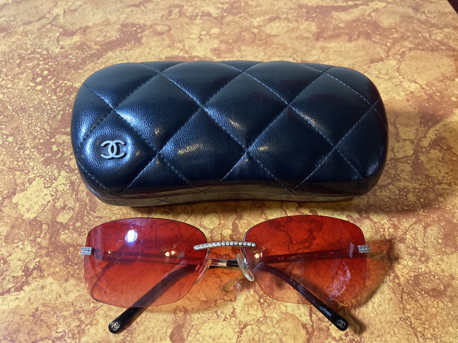 Vintage chanel rimless sunglasses Iced Out Red Lens Gem