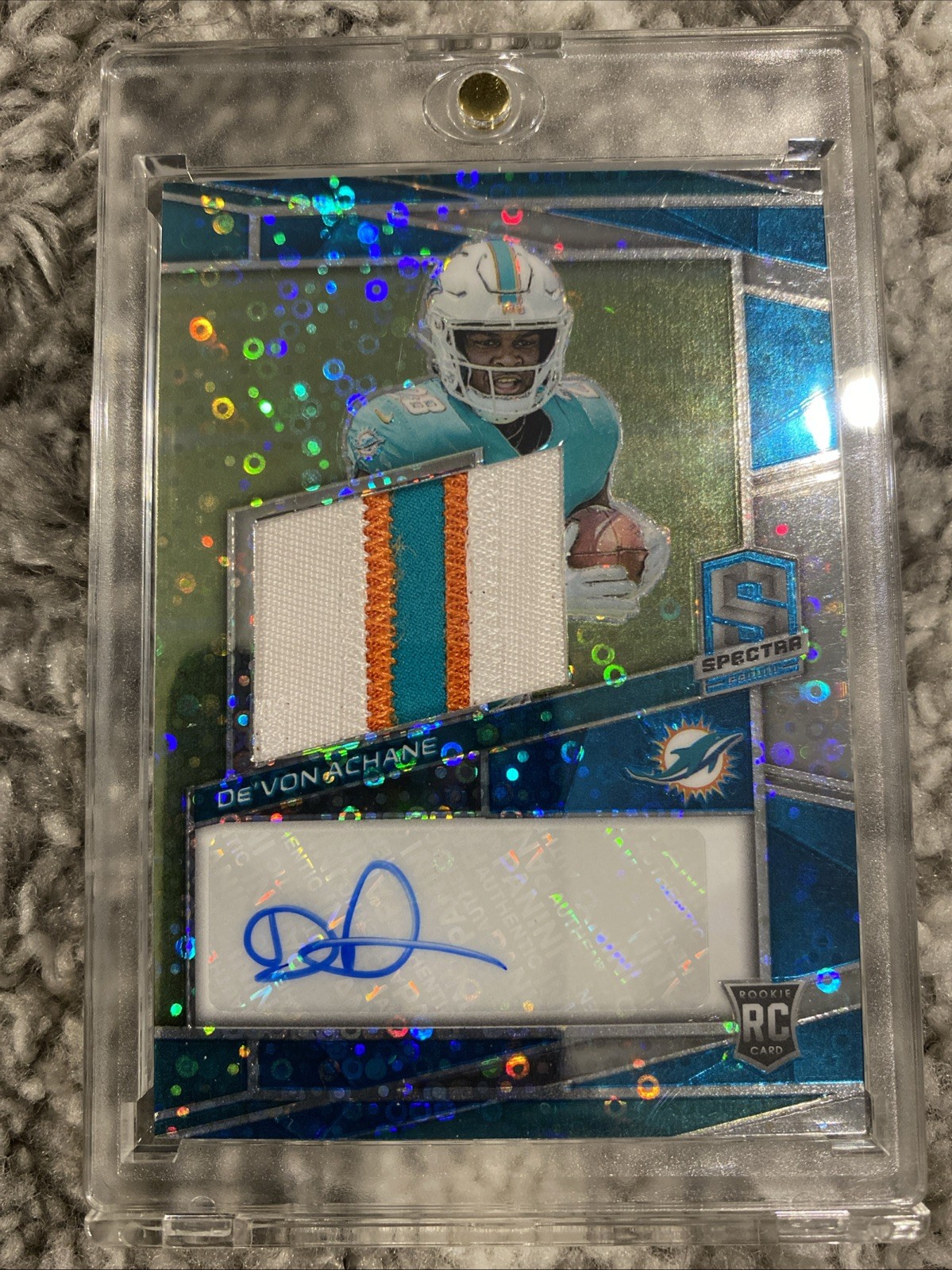 2023 Panini Spectra - Rookie Patch Auto De'Von Achane #209 Neon Blue Prizm /50