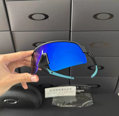 Oakley Sutro OO9463 Sunglasses Black Frame Blue Lenses