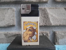 VINTAGE COLLECTIBLE CAMEL DISPOSABLE CIGARETTE LIGHTER. SPARKS! NOT LIGHTING.