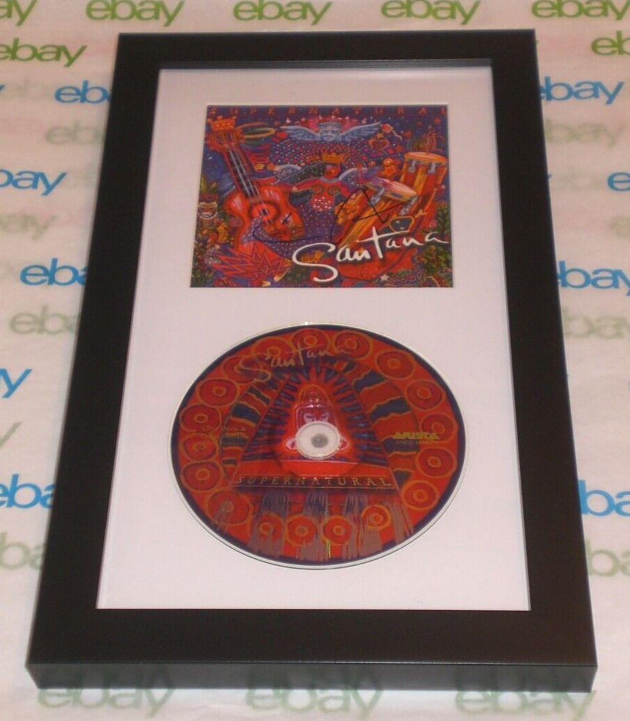 CARLOS SANTANA SIGNED & FRAMED SUPERNATURAL CD DISPLAY AUTOGRAPH