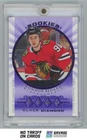 2023-24 UD Black Diamond Rookies Quad Relics Purple Connor Bedard /25 Die-Cut