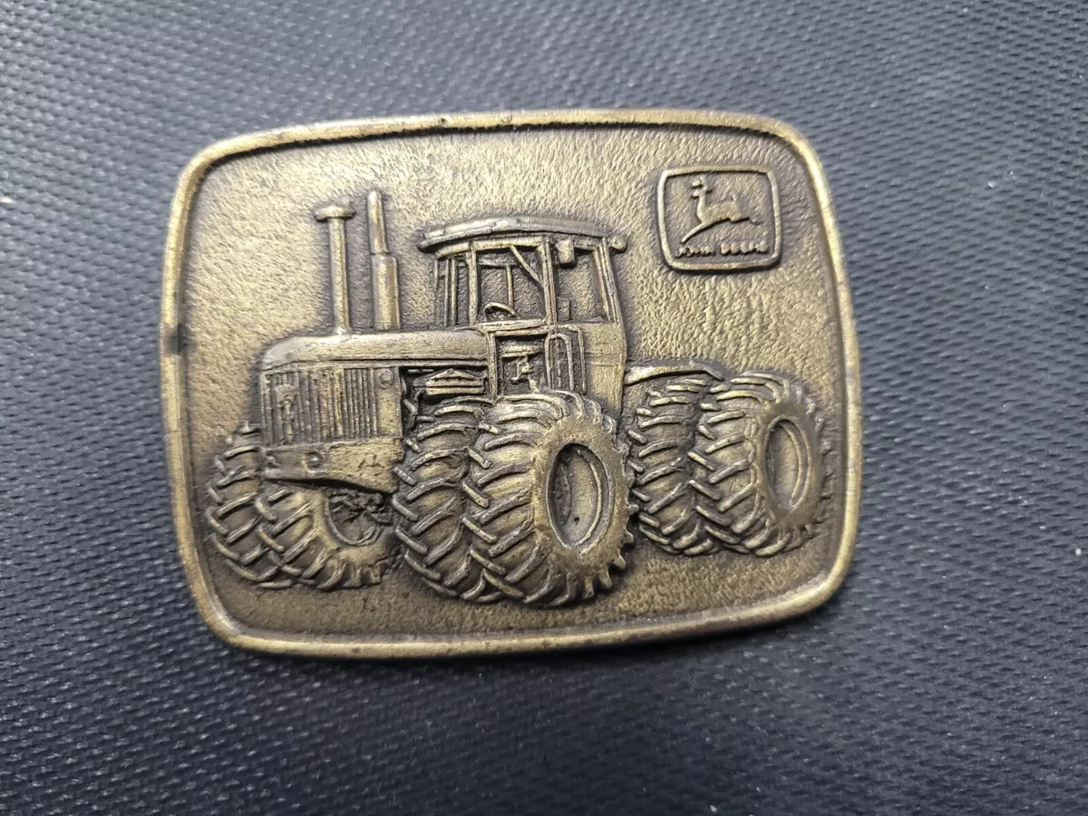 Tractor clearance belt buckle