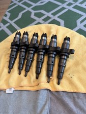 Set Of 6 Bosch F1244 Cummins 5.9l Common Rail Injector Cores - Peak Condition Set Of 6 Bosch F1244 Cummins 5.9l Common Rail Injector Cores - Peak Condition
