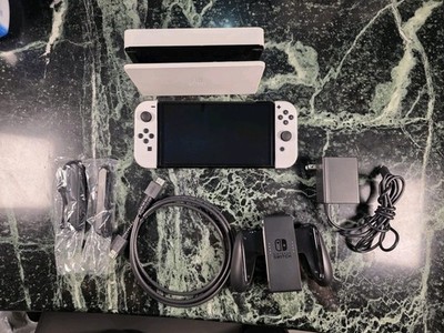 Nintendo Switch OLED Console White.    w/Dock, Power Adapter, Grip, HDMI, Straps