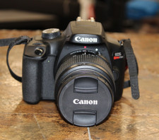 Canon EOS Rebel T100 DSLR Camera with EF-S 18-55mm f/3.5-5.6 Lens