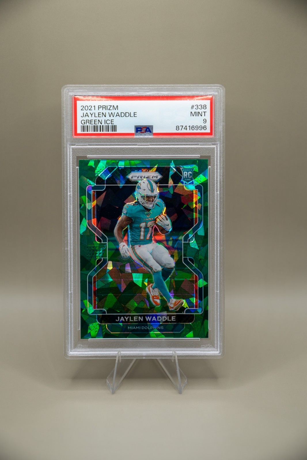 2021 Panini Prizm Jaylen Waddle Green Ice Prizm Rookie Card (#338) PSA 9
