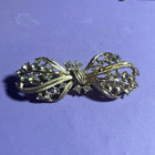 Gold Tone Bow Brooch Pin Clear Round Crystal Rhinestones Prong Set — photo 1