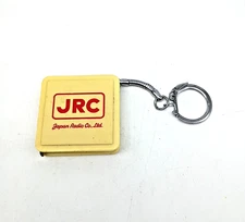 Vintage Japan Radio Co. JRC Keychain Measuring Tape Advertisement Rare HTF