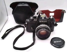 Nikon EM 35mm SLR Film Camera Nikon 50mm 1:1.8 manual focus lense Japan w/case