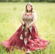 Red and Gold Formal Gown with Lace Detailing and Gold Embroidery