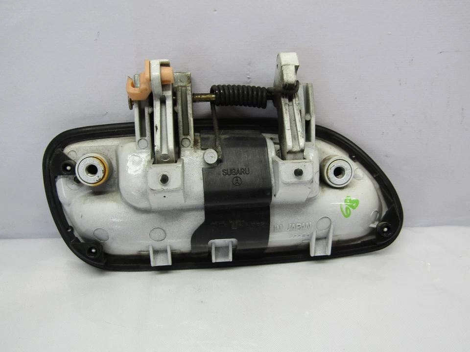 Manija de puerta exterior trasera izquierda Subaru Legacy Outback 1996-1999 OEM blanca Foto 2 de 3