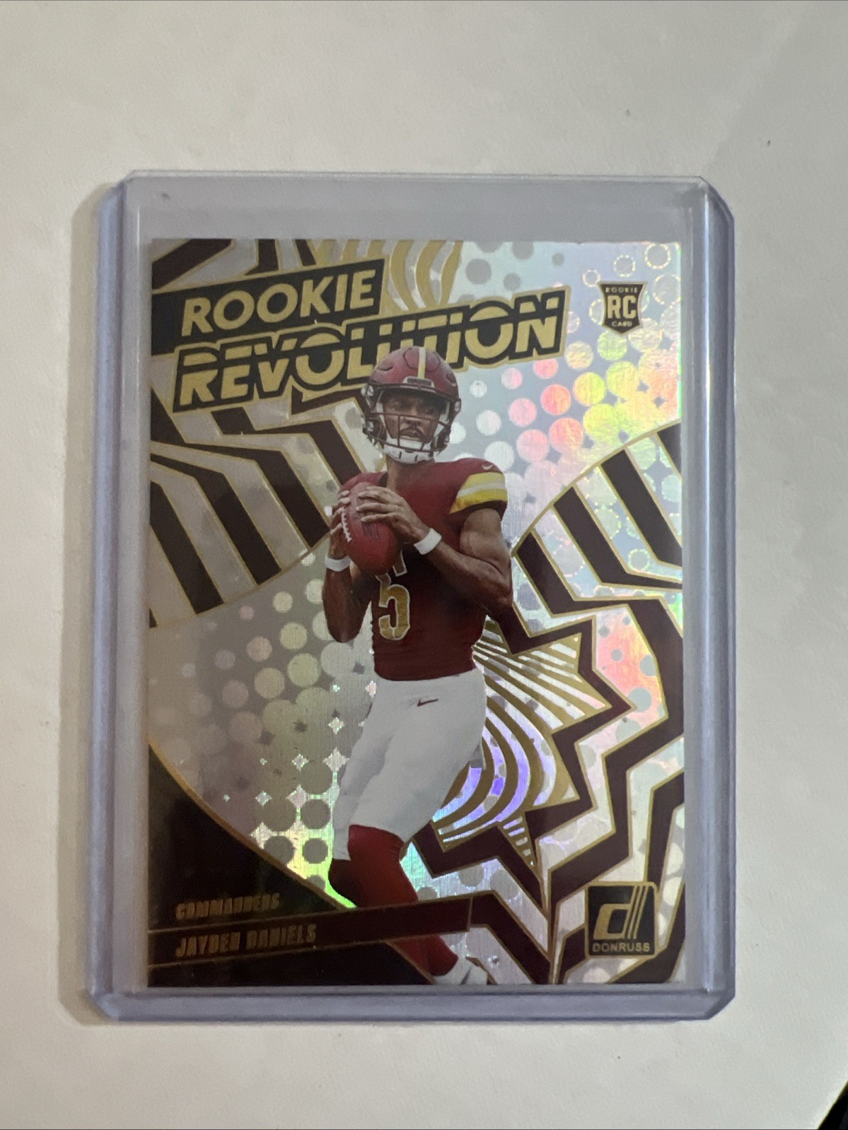 2024 Panini Donruss Football Jayden Daniels #9 Rookie Revolution (RC)