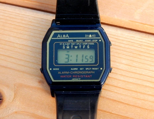 Vintage Alba Seiko Y799-4800 Wrist Watch Black Plastic Alarm-Chronograph Japan