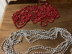 2 Plastic Strands Of Vintage Christmas Garland 1 Is Red 1 Silver Around 16’ Each