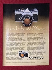 Olympus OM-1 Camera  The New Status Symbol  1977 Print Ad - Great to Frame 