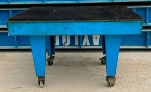 SMALL BLUE WORK TABLE WITH BRISTLE BRUSH TOP 59" L x 55 1/2" W x 38" H