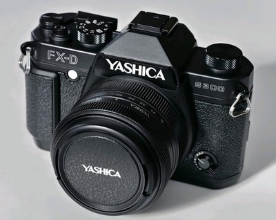 Yashica FX-D S300 ''neu'', komplett in OVP + Zubehörpaket Makroleuchte, Ladeschale
