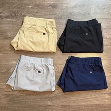 Bundle of 4 pairs of Under Armour drive tapered golf pants