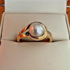 Pearl & Tanzanite ring set in 9k yellow gold