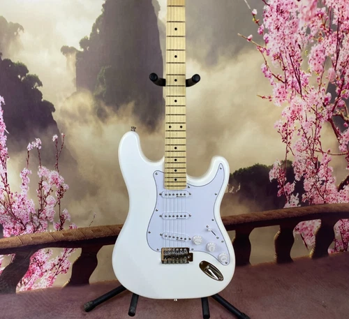 Customized white ST electric guitar with basswood body is shipped from the US