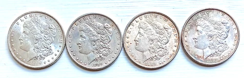 Lot of 4 1889 p Morgan Silver Dollars Higher Grade AU/EF