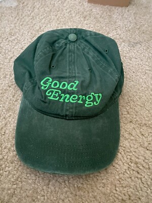 dark green cap  good energy 