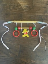 Vintage Winnie the Pooh wooden car seat/crib toy