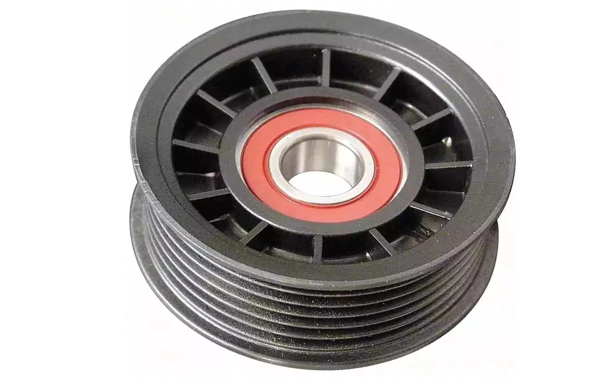 A grooved Dayco 89009 idler pulley, displayed on a white background.