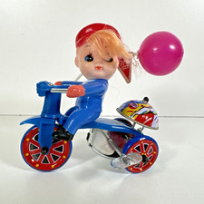 Working 1960's Wind Up Boy Riding Bicycle Tin Toy with Bell and Balloon