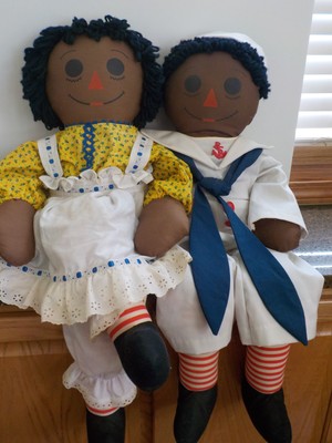 red haired doll with a triangle nose