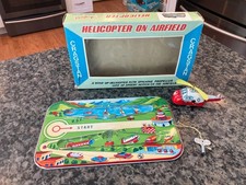 VINTAGE CRAGSTAN TPS T.P.S. CLOCKWORK TIN HELICOPTER ON AIRFIELD WORKING C VIDEO