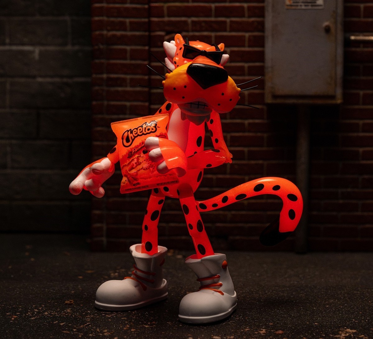 Jada 6″ Cheetos Chester Cheetah Flamin' Hot Crunchy Glow in Dark