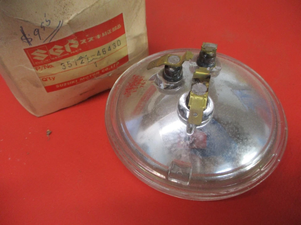 UNIDAD DE LÁMPARA NUEVA ORIGINAL OEM SUZUKI DR370 DS125 DS185 35121-46430 Foto 2 de 2