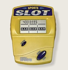 RADICA SPORTS POCKET SLOTS CASINO HANDHELD LCD ELECTRONIC GAME YELLOW model 3470