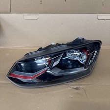 VOLKSWAGEN POLO GTI 6C 1.8 PASSENGER SIDE HEADLIGHT WITH MODULES - 1 BROKEN TAB 