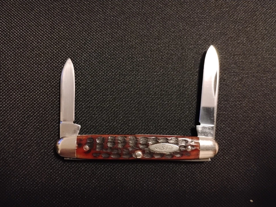 Cuchillo bolígrafo Case XX 6279 Senator, acero inoxidable, hueso rojo jigged, vintage Foto 2 de 4