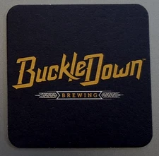 CRAFT BEER COASTER ONE Buckle Down Brewing Lyons IL 4" 2 sided 2013 IL-BUCK-1