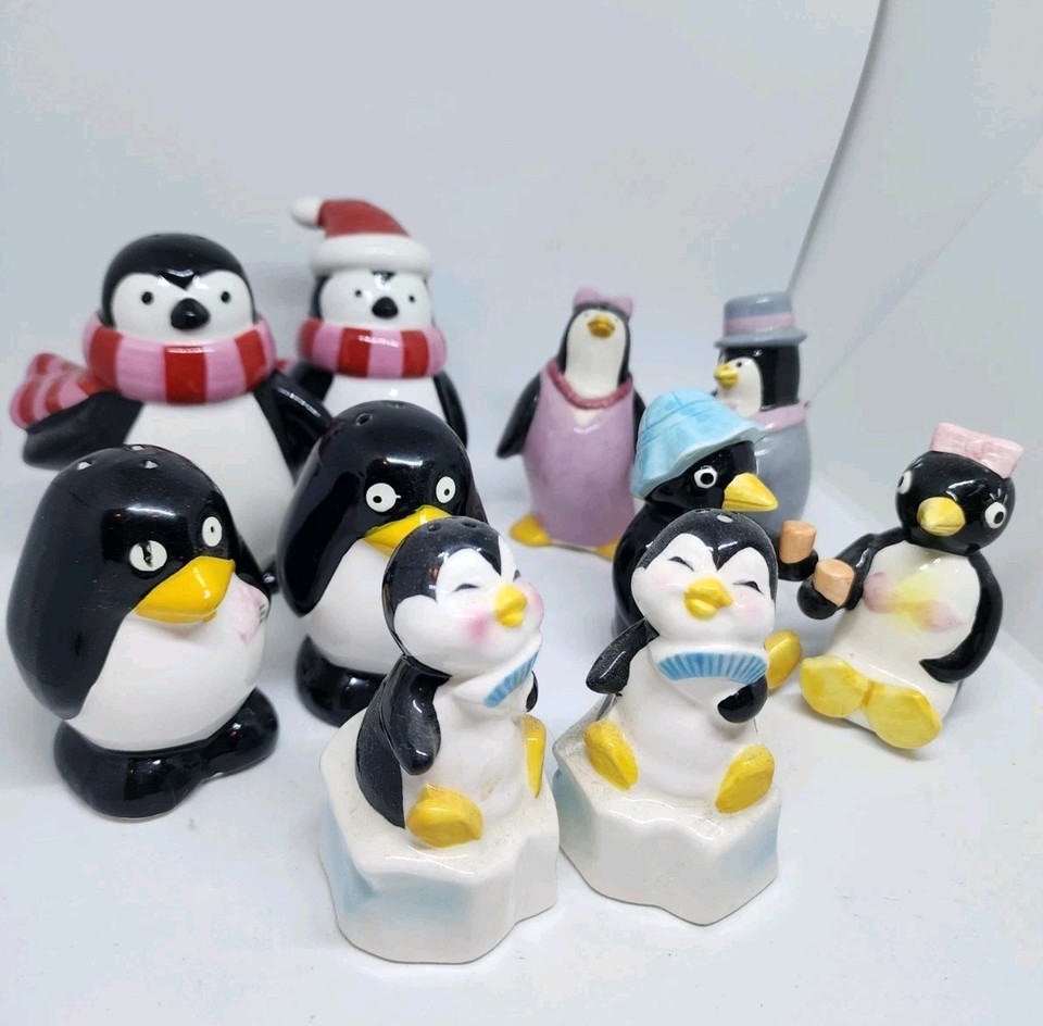 A whole colony of vintage penguin salt & pepper shakers — iceberg-themed, novelty popsicle pieces included — this is peak mid-century kitchen kitsch in one delightful lot.