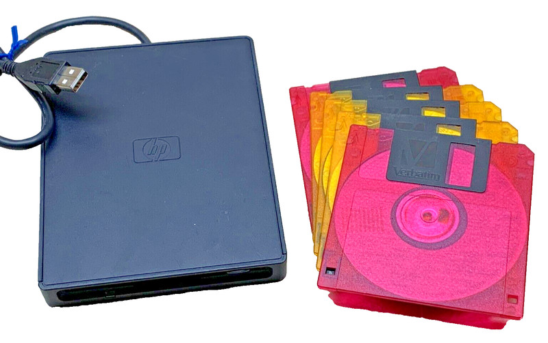 HP Floppy Disk Drive, 3.5" and 5 New Floppy Disks