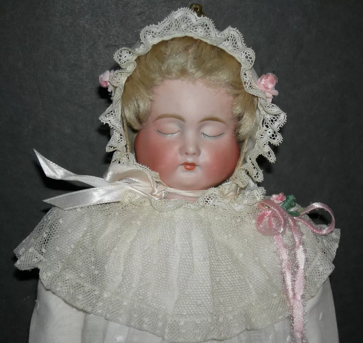 Antique porcelain doll sales with 3 faces