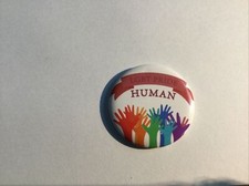 PRIDE LGBTQ button pin-back Hands In Rainbow Colors on White background