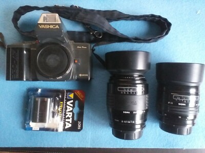 Yashica 230-AF mit Sigma 28-70mm + Sigma 70-210mm + integrierter Blitz