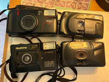 Nikon Zoom Touch 400, Minolta and two Keysone cameras, all untested. Free Ship