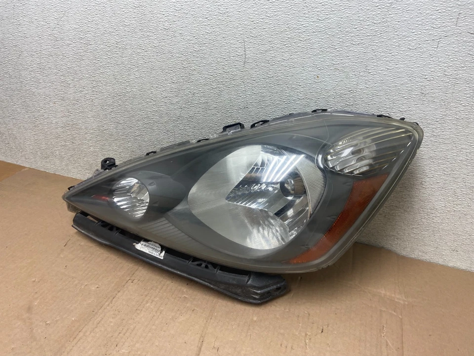 Faro lateral izquierdo halógeno OEM R1415 DG Honda Fit 2009 a 2013 conductor izquierdo Foto 2 de 4