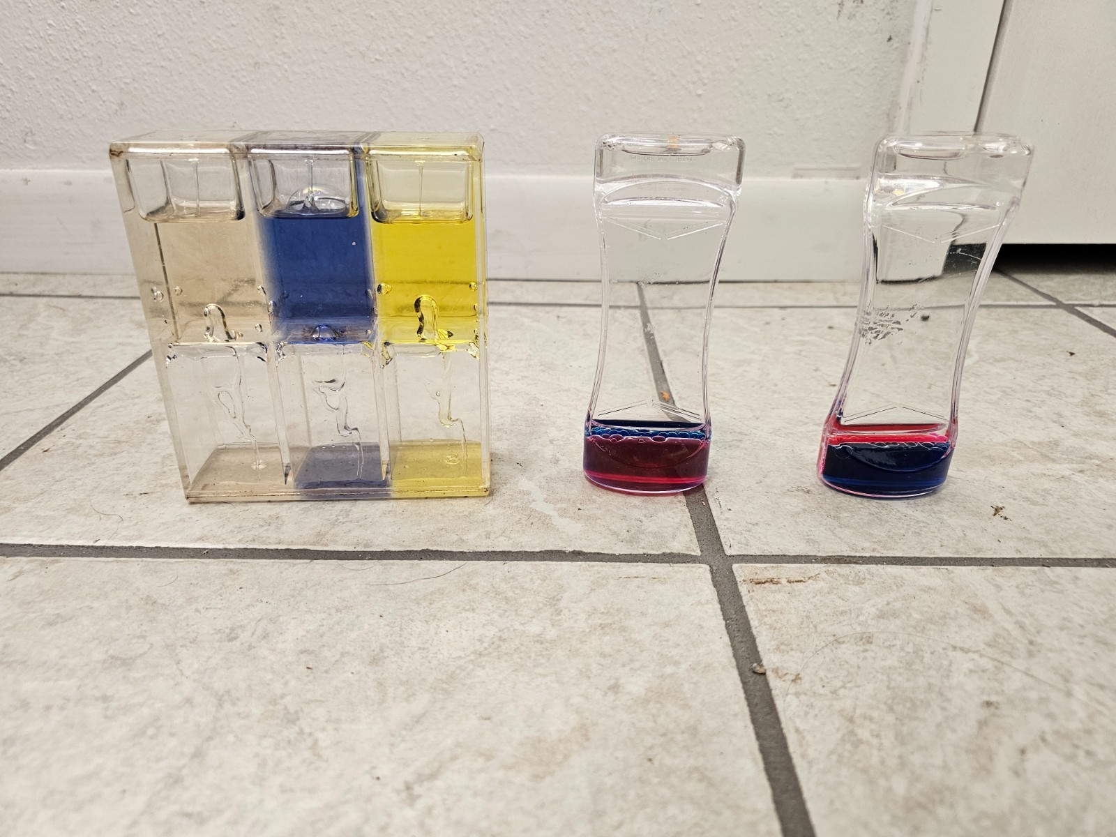 Triple Ooze Blacklight Reactive Pink Yellow Orange Baby Einstein sensory toy