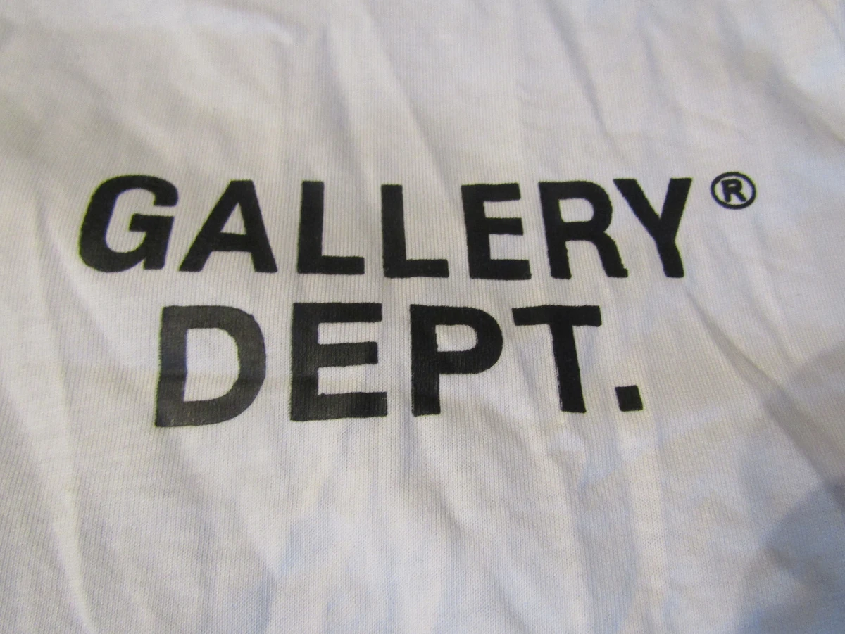 White shirt with black writing 2025
